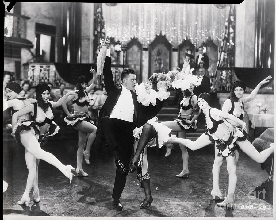 John Gilbert Dances With Girls In Movie Photograph by Bettmann