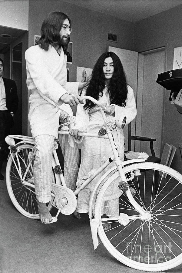 John Lennon Sitting On Bicycle Photograph by Bettmann