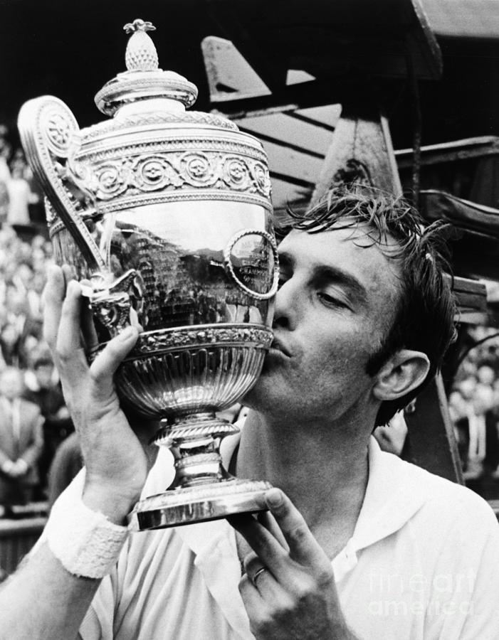 John Newcombe Kisses Wimbledon Trophy Photograph by Bettmann