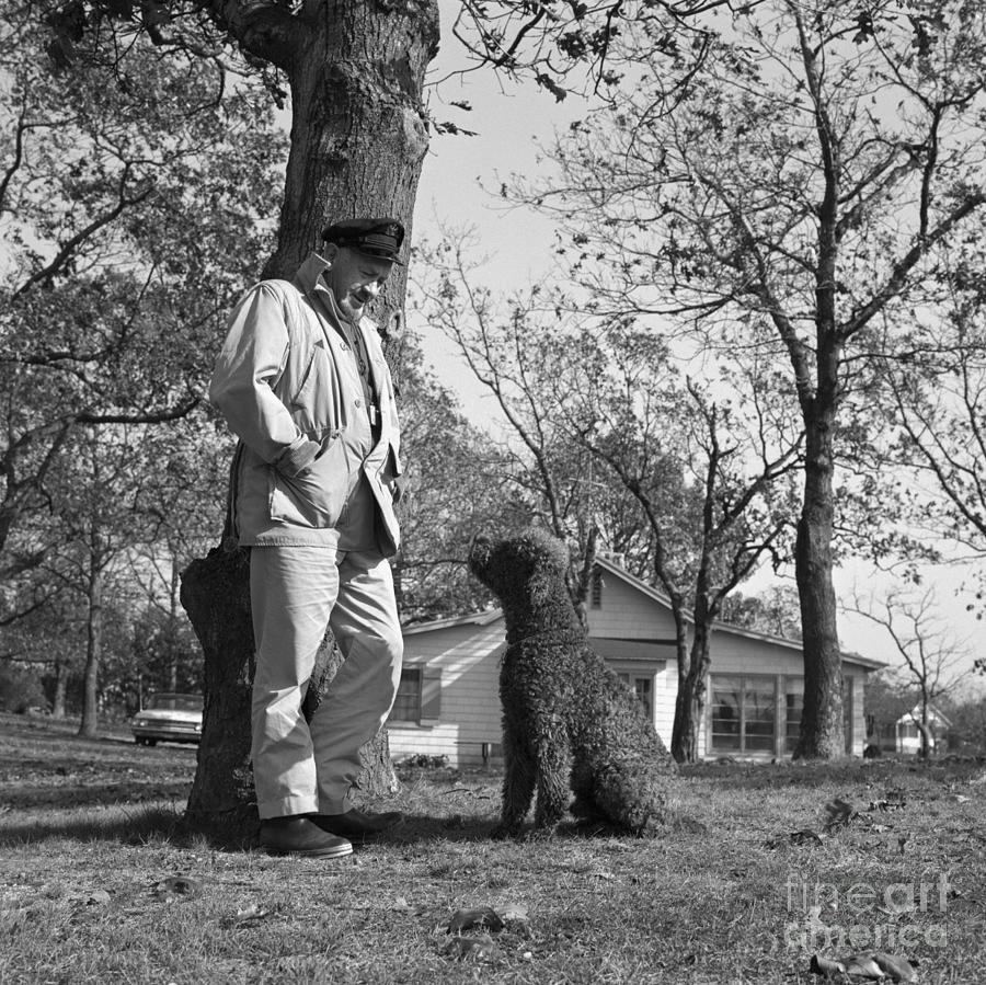 John Steinbeck And Dog Charlie Photograph by Bettmann