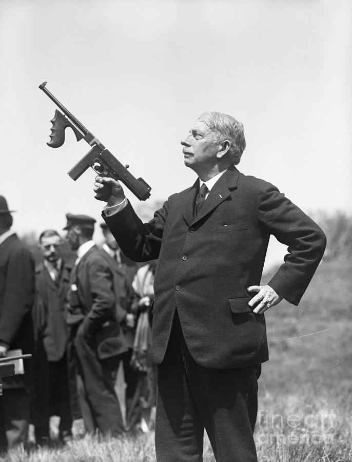 John Thompson Holding Machine Gun Photograph by Bettmann