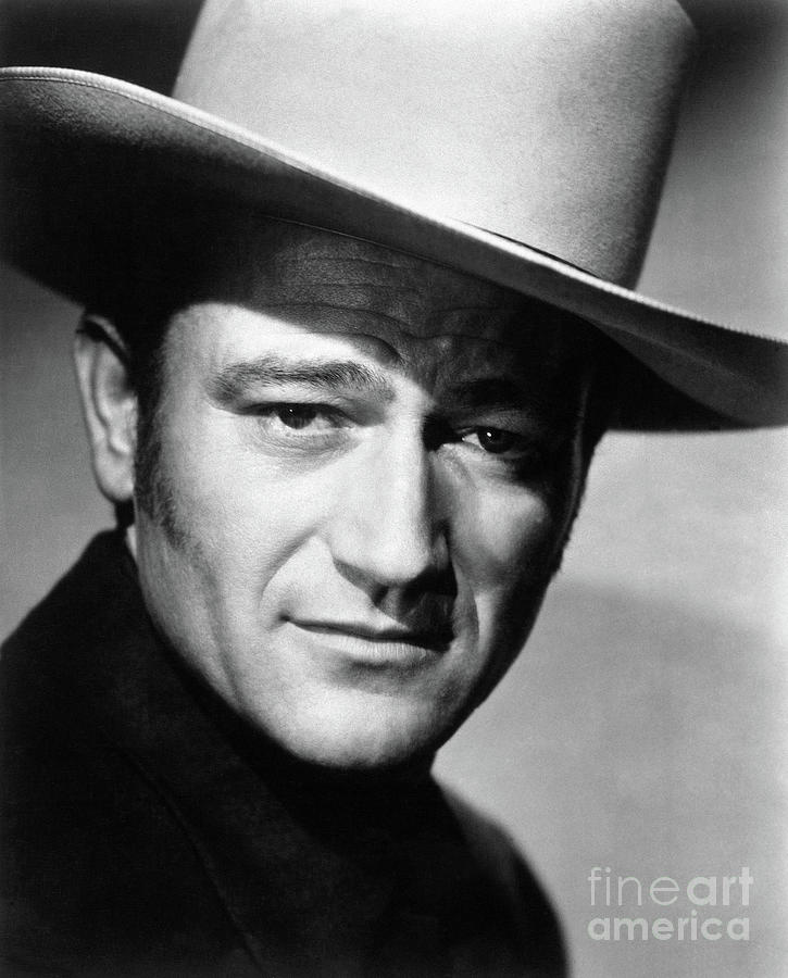 John Wayne In A Cowboy Hat by Bettmann
