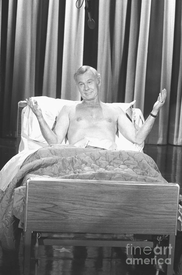 Johnny Carson Looking Comfortable In Bed Photograph by Bettmann