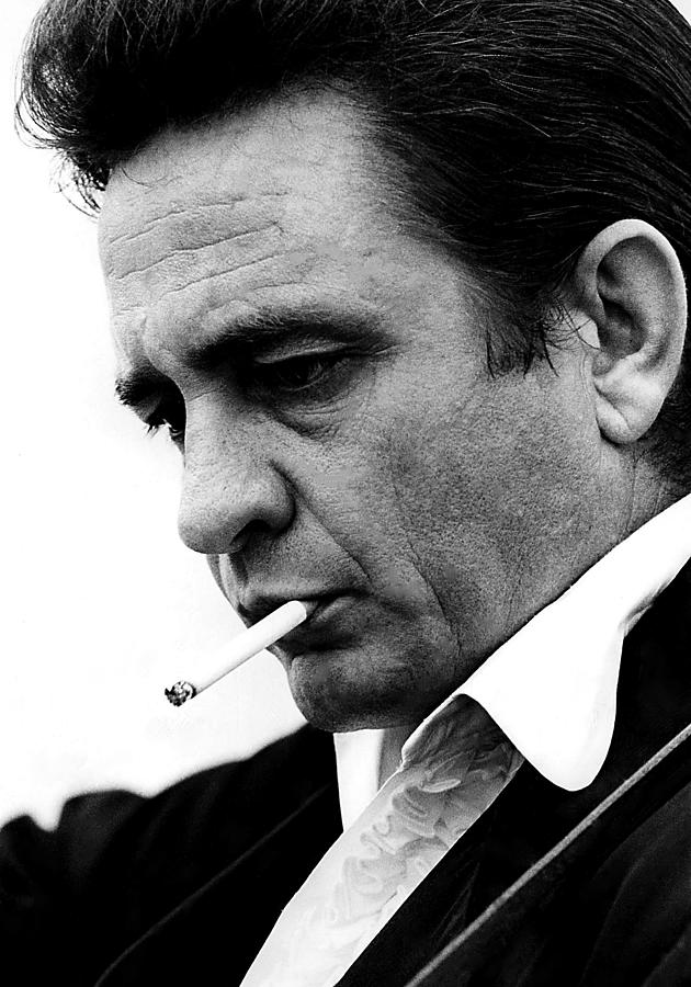 Johnny Cash Photograph - Johnny Cash Smoking And Playing At Folsom Prison by Globe Photos