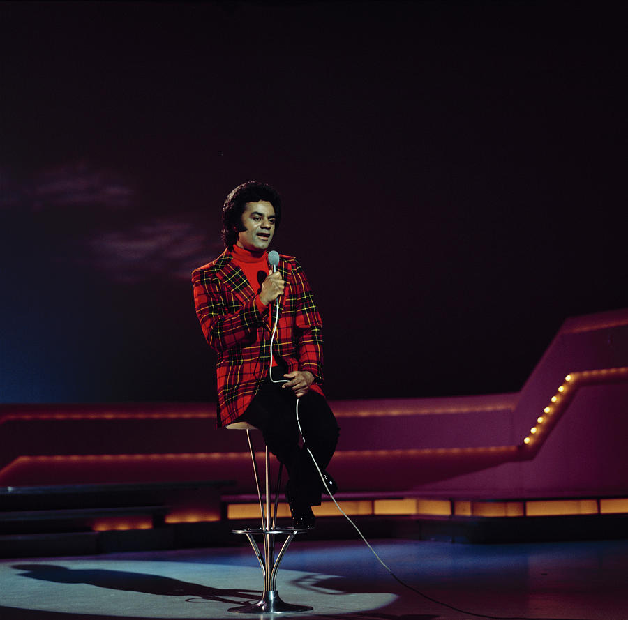 Johnny Mathis Performs On Stage Photograph by Colin Fuller