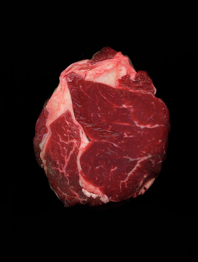 Joint Of Beef Against Black Background Photograph by Mike Hill