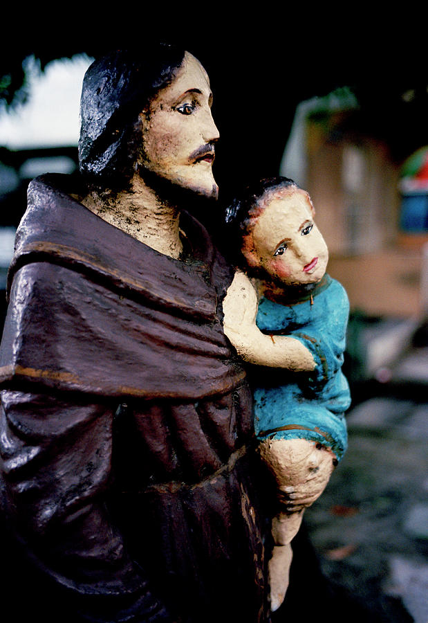 Joseph And Jesus In Manila Photograph by Shaun Higson