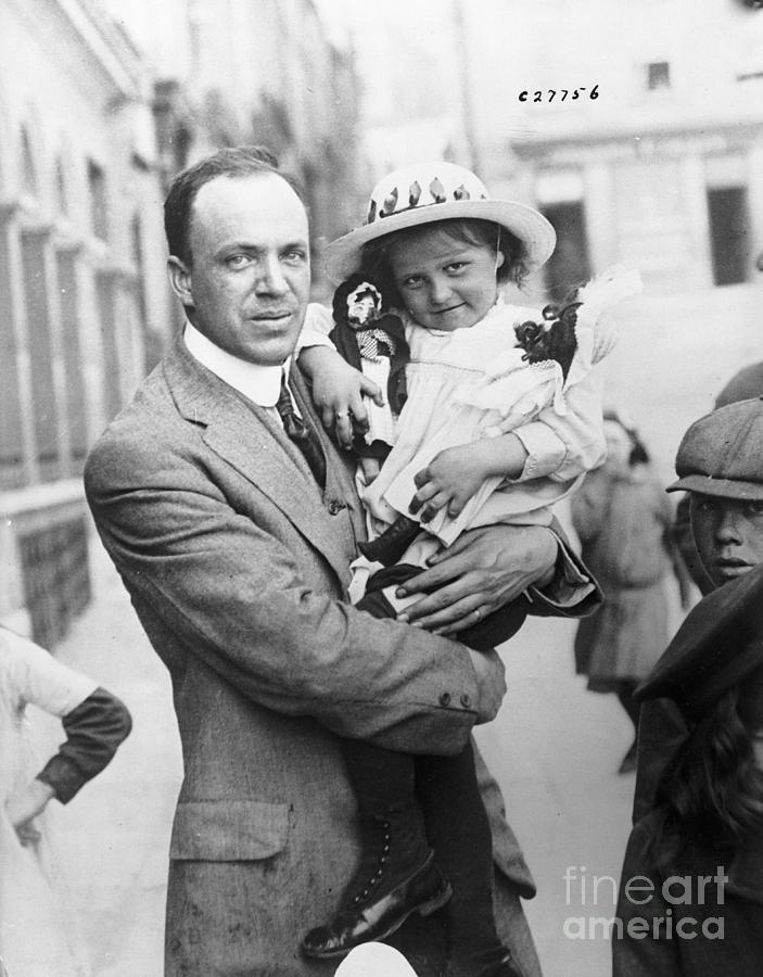 Journalist And Little Girl Rescued Photograph by Bettmann