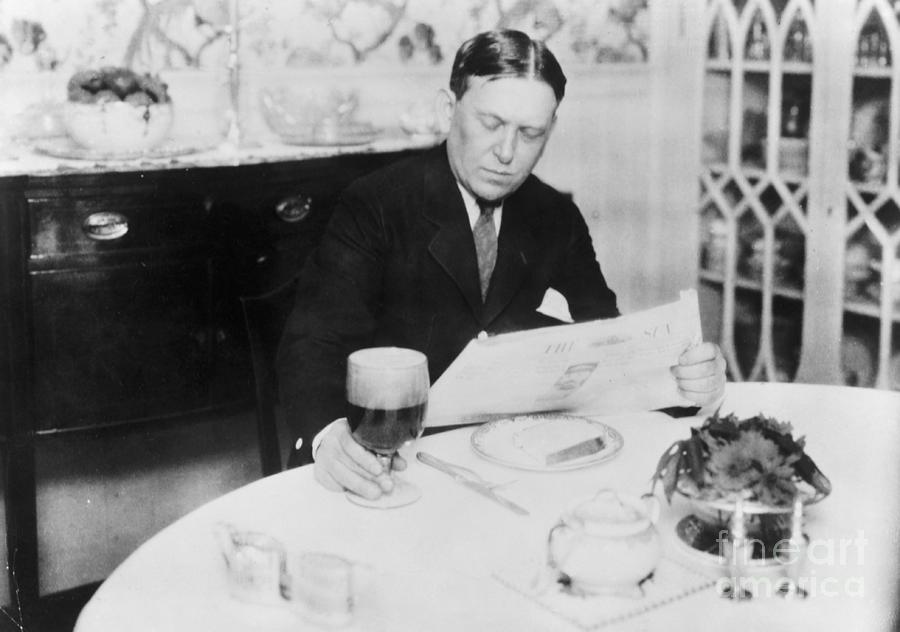 Journalist H.l. Mencken Reading Photograph by Bettmann
