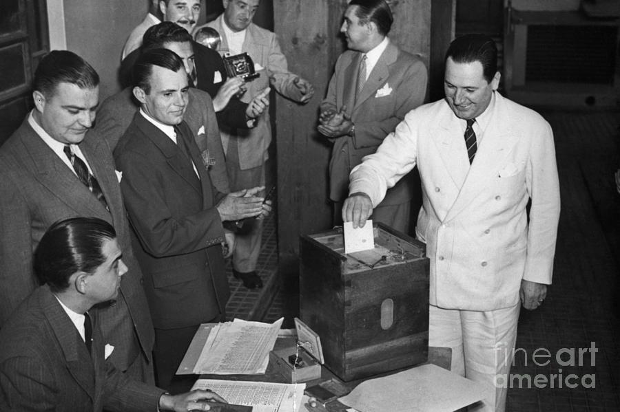 Juan Peron Voting In Argentina Photograph by Bettmann
