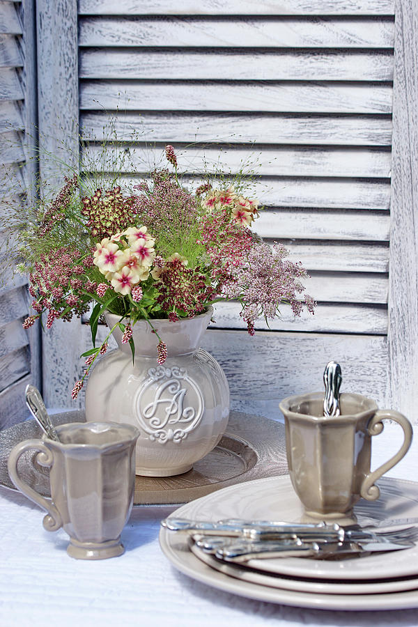 Jug Of Wild Carrot dara Flowers, Place Setting With Mugs And Silver Cutlery Photograph by Angelica Linnhoff