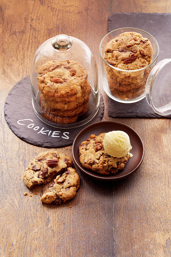 Jumbo Cookies With Chocolate Pieces And Pecans, With Vanilla Ice Cream Photograph by Stockfood Studios /  Katrin Winner