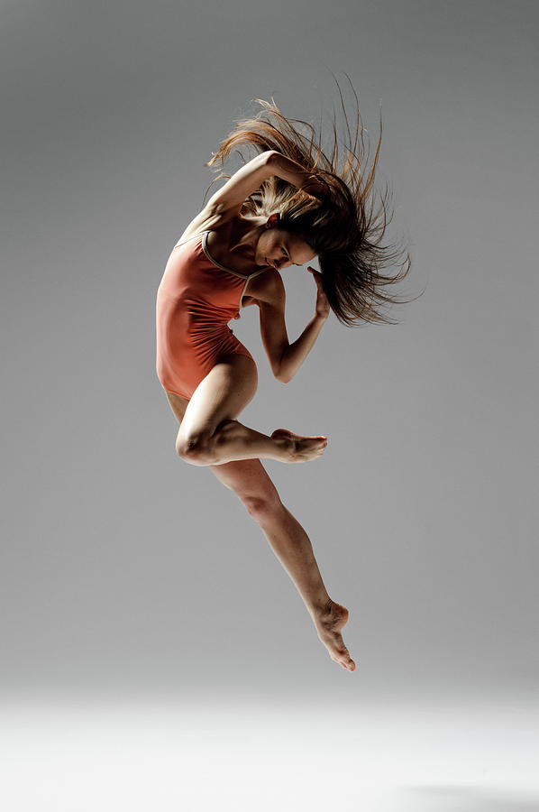 Jumping Dancer Photograph by Copyright Christopher Peddecord 2009