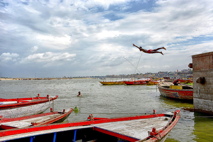 Jumping On The Ganga Photograph by Shaibal Nandi