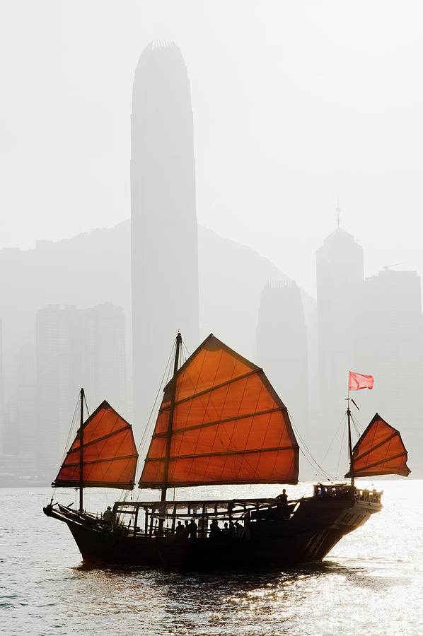 Junk Boat In Victoria Harbour Hong Kong Photograph by Deejpilot