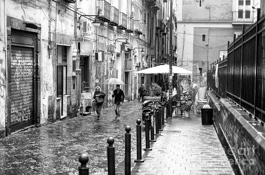 Just Walking in the Rain Naples Photograph by John Rizzuto