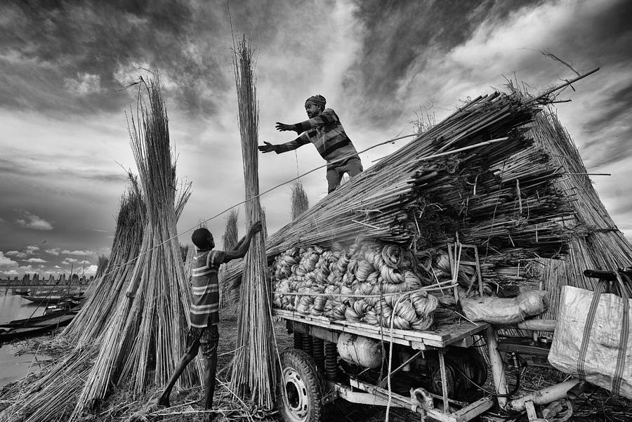People Photograph - Jute Straws - Men At Work by Abhraneel Chakraborty