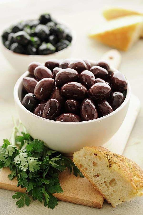 Kalamata Olives In A Bowl, With Parsley And Bread Photograph by Peters, Ina