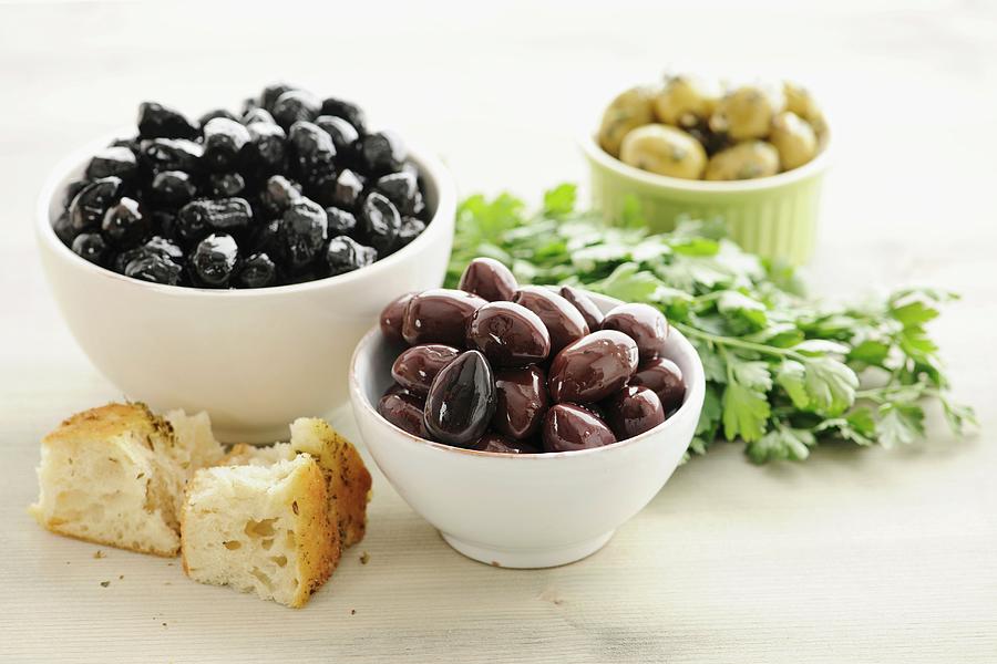 Kalamata Olives In Bowls, With Bread And Parsley Photograph by Peters, Ina