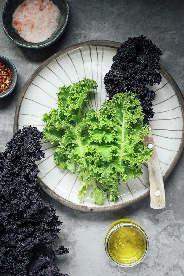 Kale With Olive Oil, Chili Flakes, Salt And Pepper Photograph by Kate Prihodko