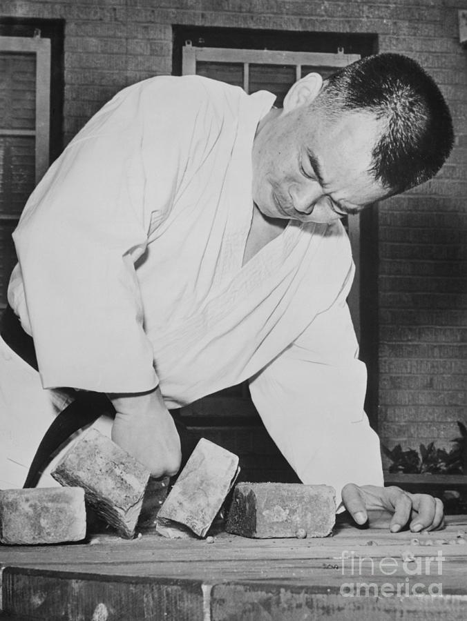 Karate Expert Jhoon Rhee During Brick Photograph by Bettmann Karate Expert Jhoon Rhee During Brick Photograph by Bettmann