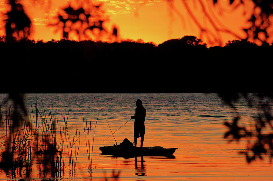 Kayak Fishing in Florida Photograph by Daniel Woodrum