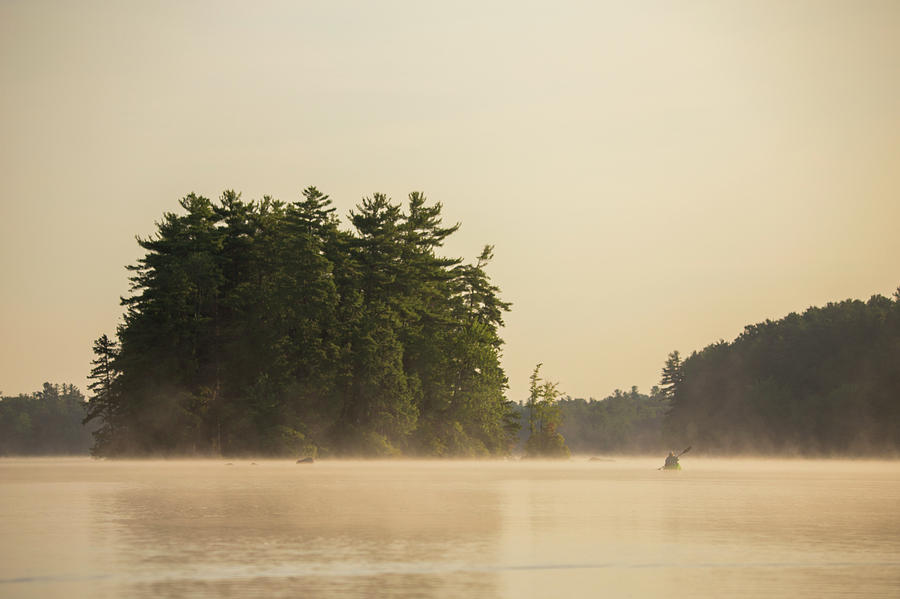 Kayaker On Lake In Morning Fog Photograph