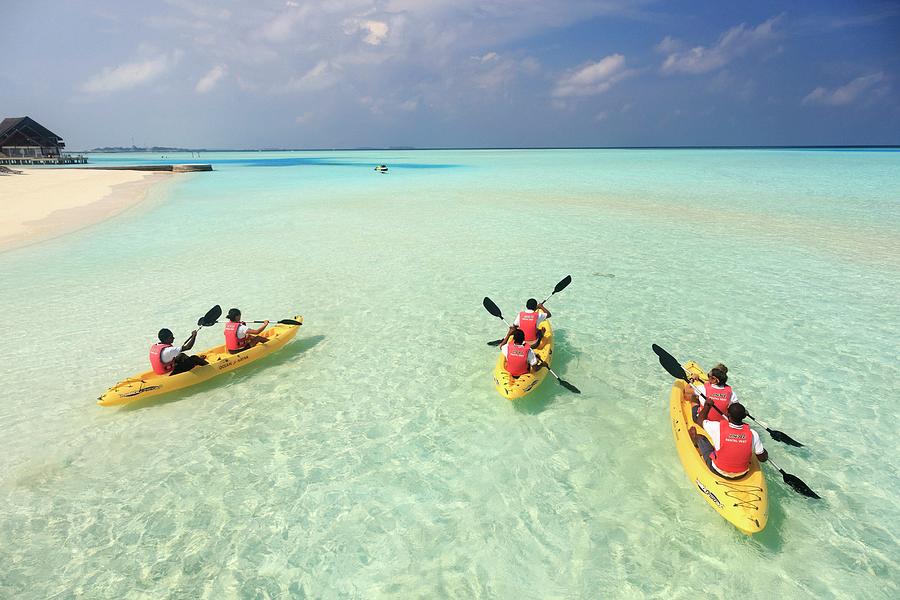 Kayaking In South Male Atoll, Maldives Digital Art by Maurizio Rellini