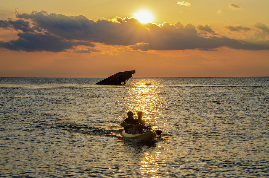 Kayaking Sunset Point - Cape May New Jersey Photograph by Bill Cannon