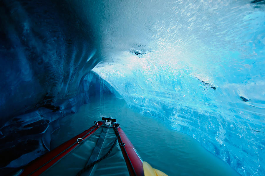 Kayaking Thru The Ice Cave Photograph by Noppawat Tom Charoensinphon