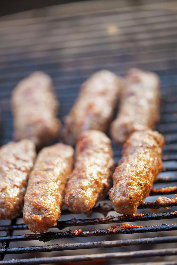 Kebapche grilled Minced Meat, Bulgaria On The Barbecue Photograph by Studio Lipov