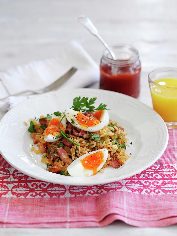 Kedgeree rice Dish, England With Bacon And Egg Photograph by Gareth Morgans