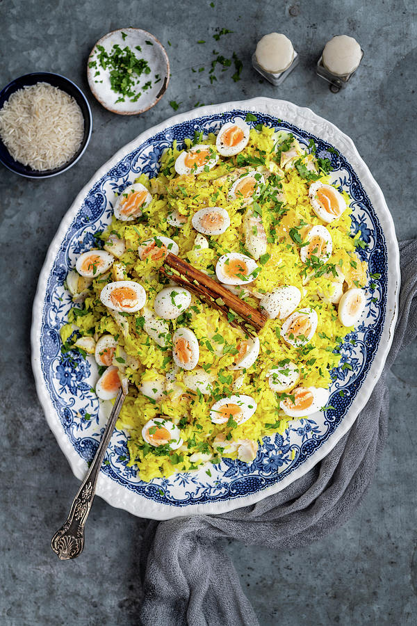 Kedgeree With Saffron, Eggs And Haddock Photograph by Lucy Parissi