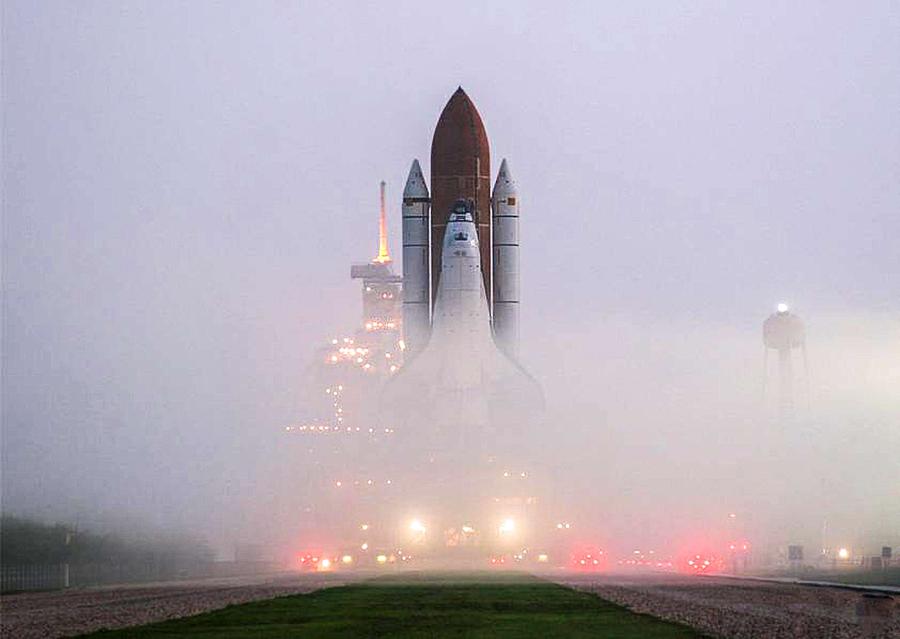 KENNEDY SPACE CENTER, FLA. the fog on Launch Pad 39B is pierced by lights on vehicles and the servic Painting by Celestial Images