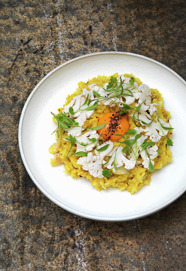 Kichri - Indian Rice With Cauliflower And An Egg Yolk Photograph by Hugh Johnson