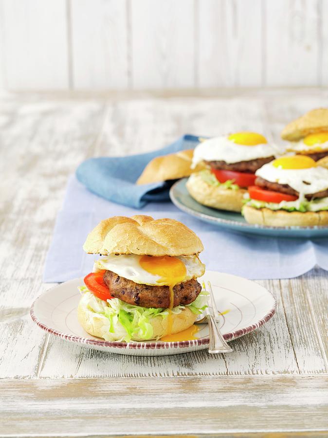 Kidney Bean Burgers With Tomatoes And Fried Eggs Photograph by Rua Castilho