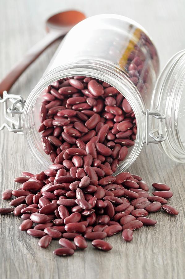 Kidney Beans In An Overturned Jar Photograph by Jean-christophe Riou