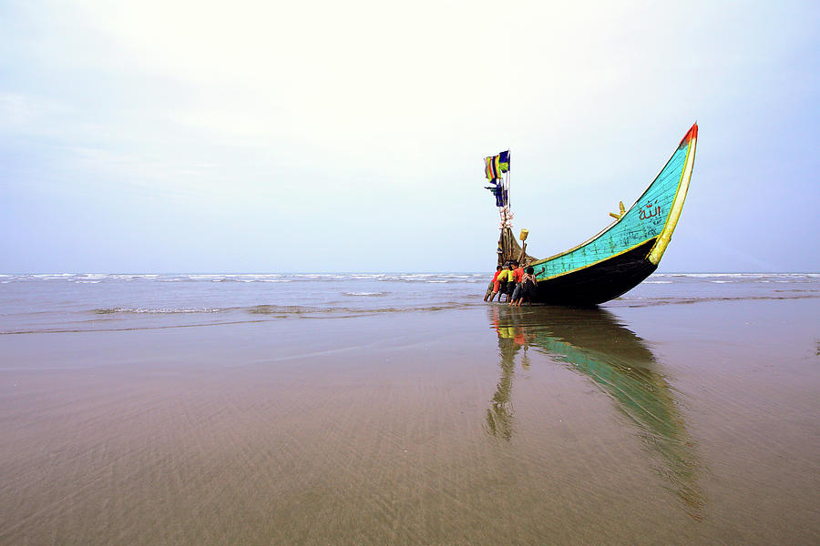 Kids Are Trying To Move Fishing Boat On Photograph by Mohammad Mustafizur Rahman