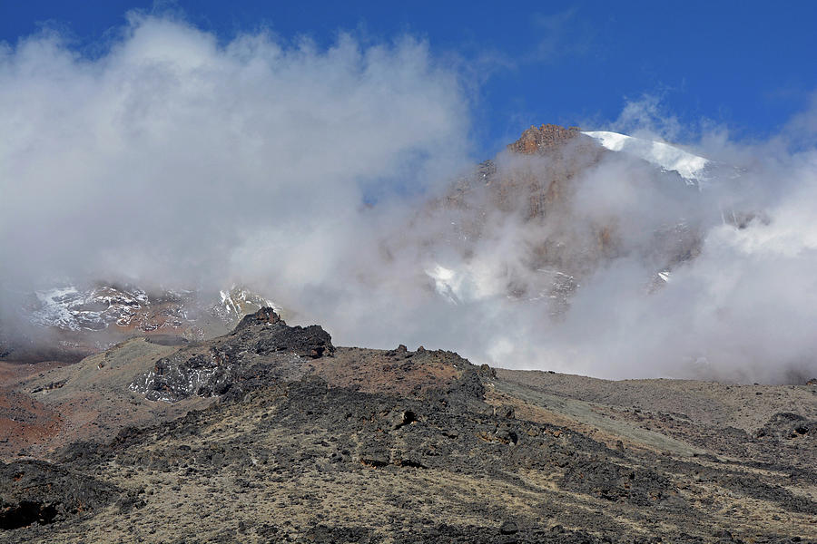 Kilimanjaro, East Africa, View Of The Summit, Third Stage, Between Shira Camp And Barranco Camp, Rising Fog, Inhospitable Landscape Without Vegetation, Lava Rock Photograph by Claudia Reithmeir