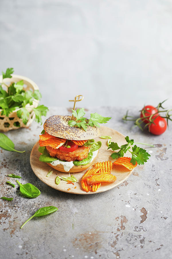 Kimchi Bagel With Sweet Potato Chips And Tomatoes Photograph by Sabrina Sue Daniels