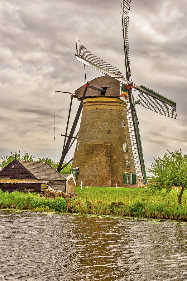 Kinderdijk  Holland Windmill Photograph by Donald Pash