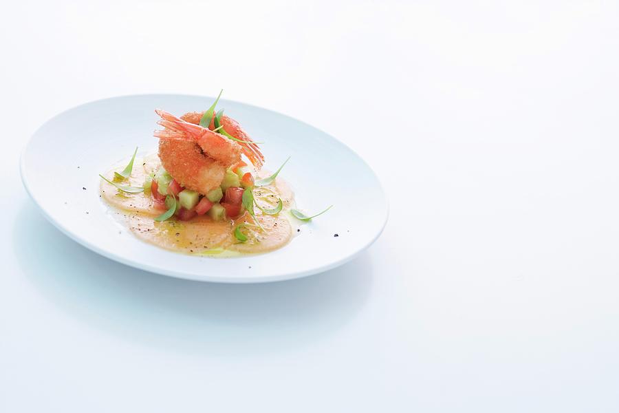 King Prawns On A Vegetable Salad And Melon Carpaccio Photograph by Michael Wissing