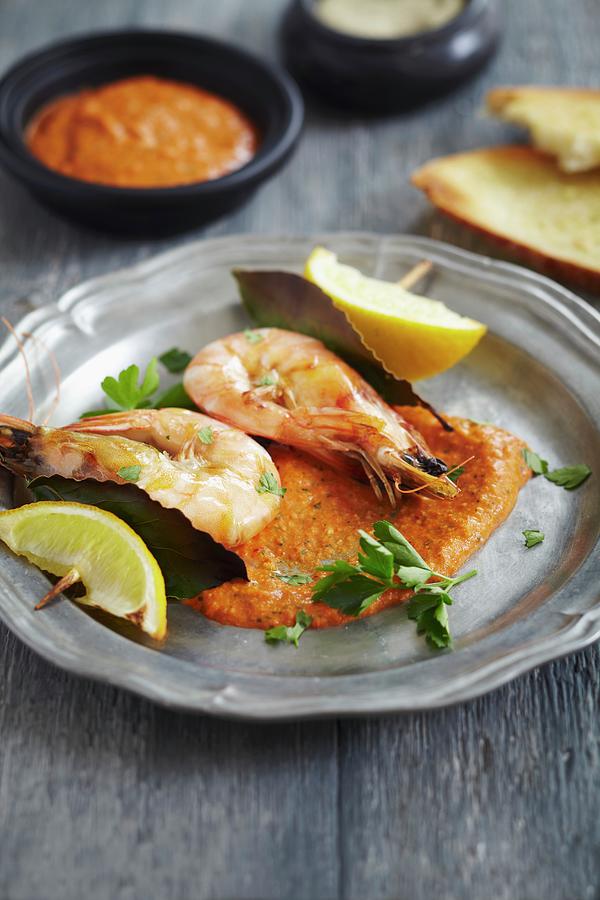 King Prawns Served With Red Pepper Hummus Photograph by Charlotte Tolhurst