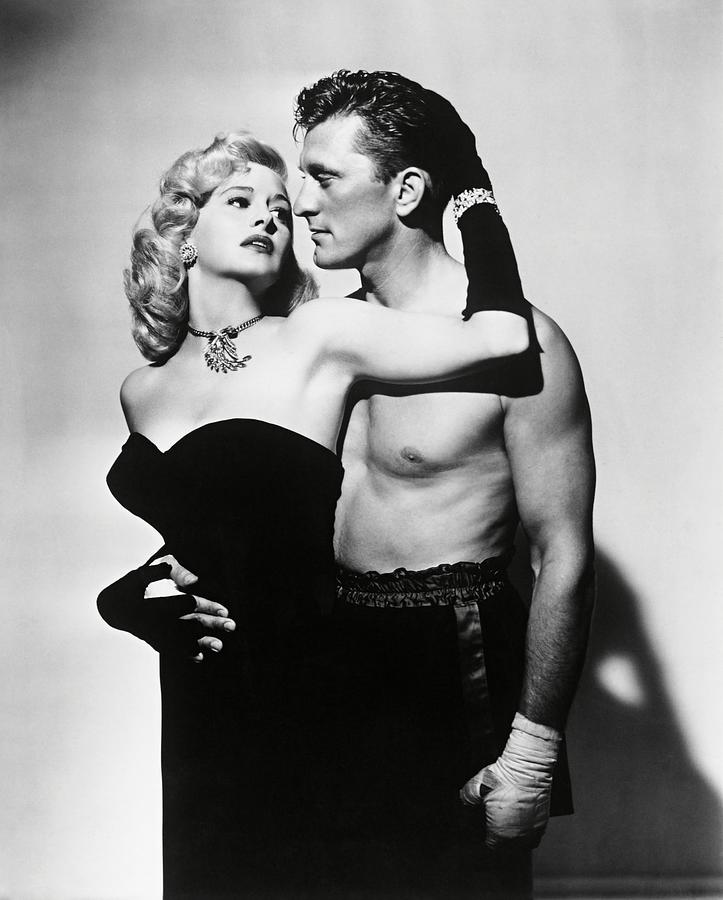 Kirk Douglas Photograph - KIRK DOUGLAS and MARILYN MAXWELL in CHAMPION -1949-. by Album
