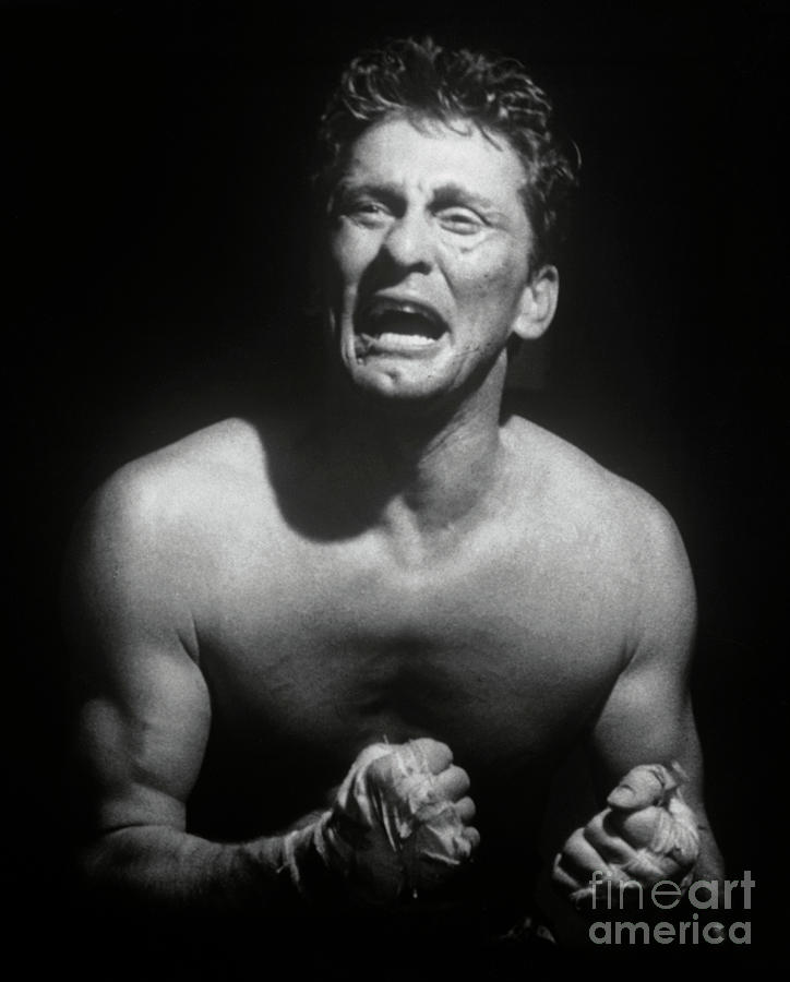 Kirk Douglas Grimacing In Boxing Scene Photograph by Bettmann