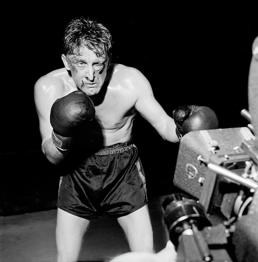 Celebrity Photograph - Kirk Douglas In Front Of The Camera In Champion by Peter Stackpole