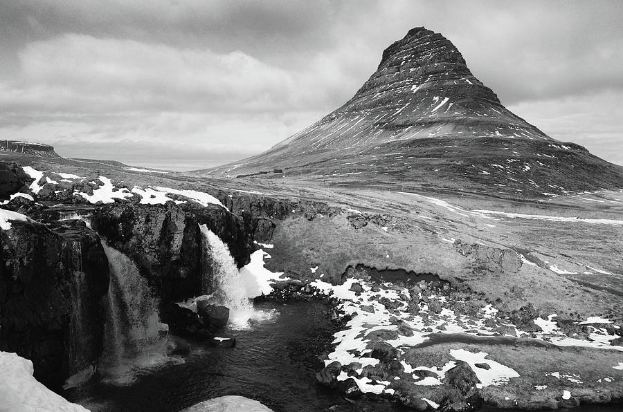 Kirkjufellsfoss Waterfall Beneath Kirkjufell Mountain Peak Springtime Iceland Black and White Photograph by Shawn OBrien