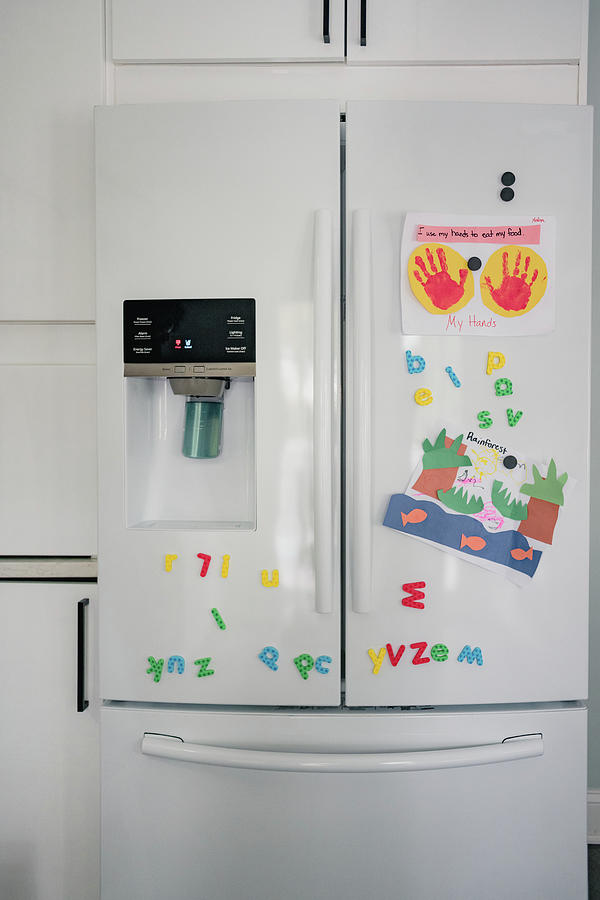 Kitchen Fridge With Magnets And Kid Crafts Photograph by Cavan Images -  Pixels