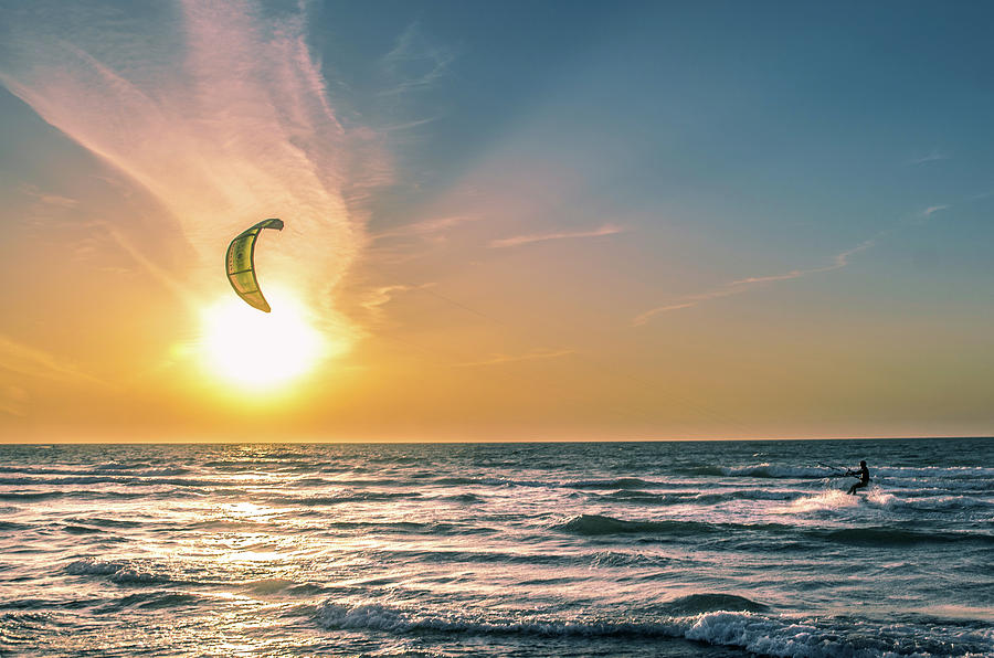 Kitesurfing at sunset Photograph by Michael Goyberg