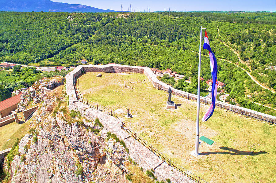 Architecture Photograph - Knin fortress plateau nad large croatian flag aerial view, by Brch Photography